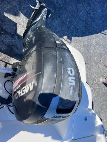 Slide: The Image of 2018 Bayliner 210 Deck Boat with Mercury 150 outboard motor. - 12