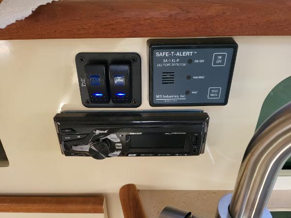 Slide: The Image of Control panel of a 1995 Bayliner 2355 Ciera Sunbridge boat with Safe-T-Alert system. - 10