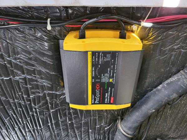 Slide: The Image of Battery charger installed in a 1995 Bayliner 2355 Ciera Sunbridge boat. - 24