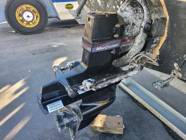Slide: The Image of 1995 Bayliner 2355 Ciera Sunbridge with MerCruiser outdrive in a parking lot. - 25