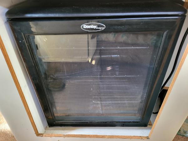 Slide: The Image of Danby Designer mini fridge in a 1995 Bayliner 2355 Ciera Sunbridge boat. - 8