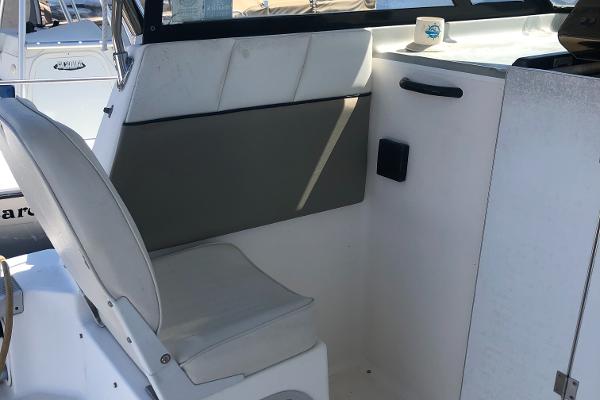 Slide: The Image of 1998 Bayliner 2452 Ciera Express boat interior seating area. - 10