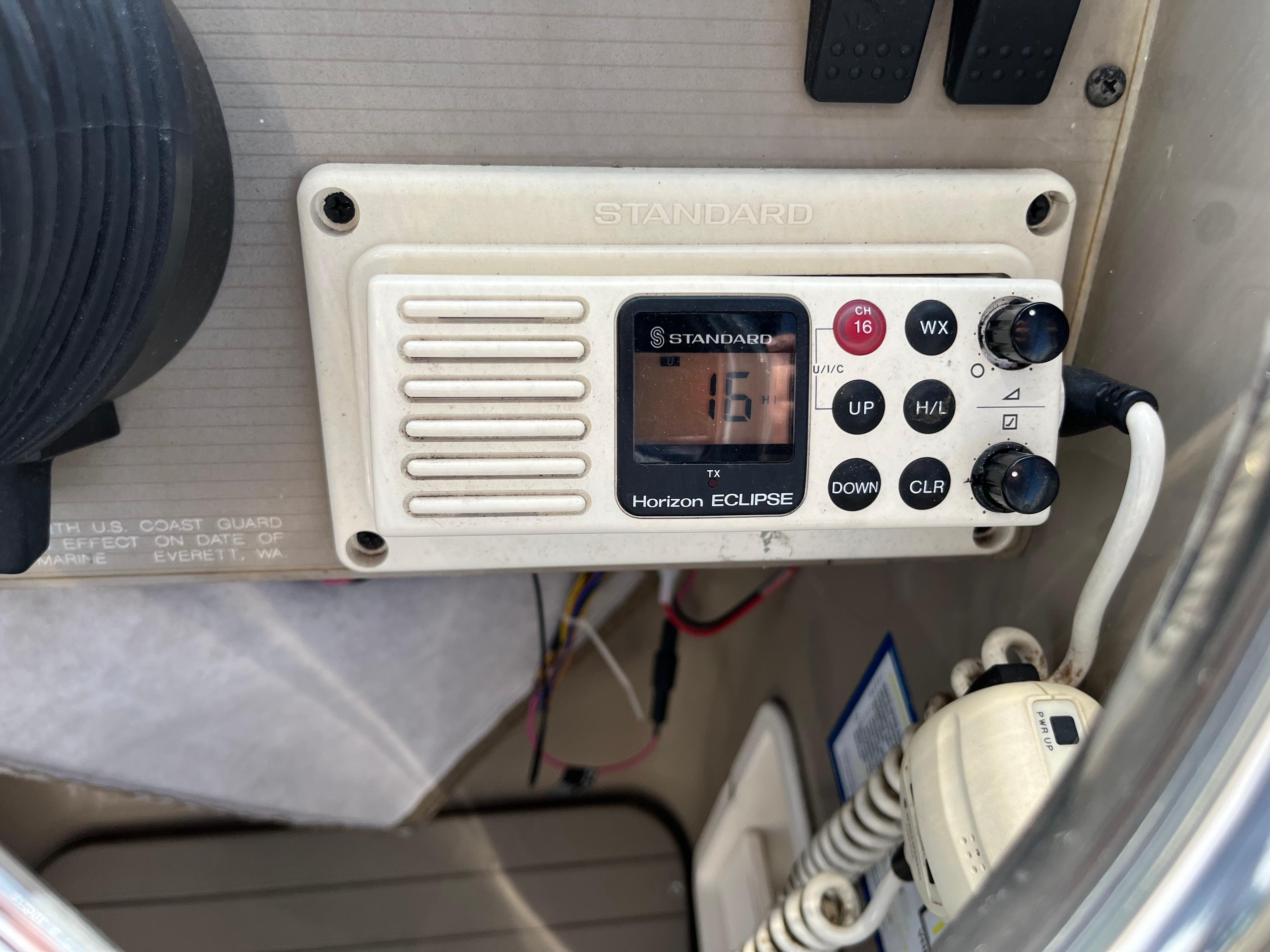 Slide: The Image of VHF radio control panel on a 1996 Bayliner 32 Avante boat. - 13