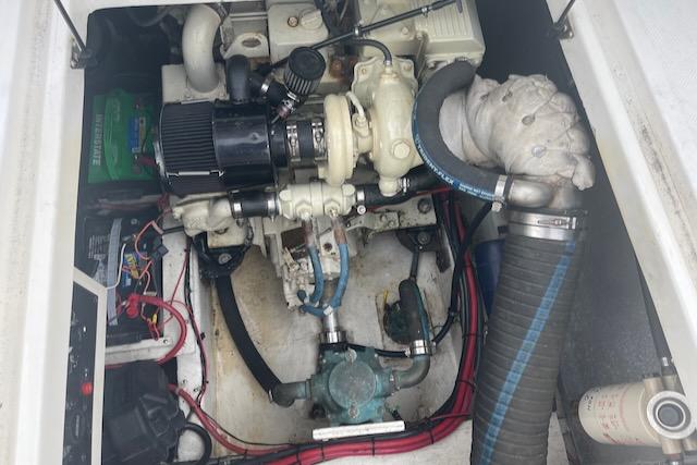 Slide: The Image of Bayliner 3388 2000 model engine compartment with visible wiring and components. - 22
