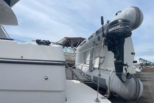 Slide: The Image of Bayliner 3388 2000 model with Mercury outboard motor and inflatable dinghy. - 35