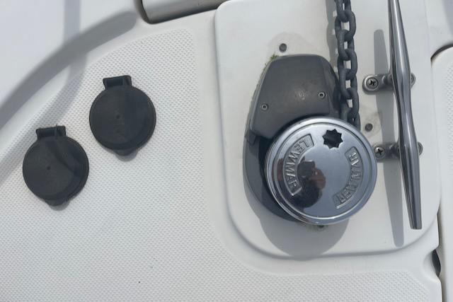 Slide: The Image of Close-up of anchor windlass on 2000 Bayliner 3388 boat. - 39