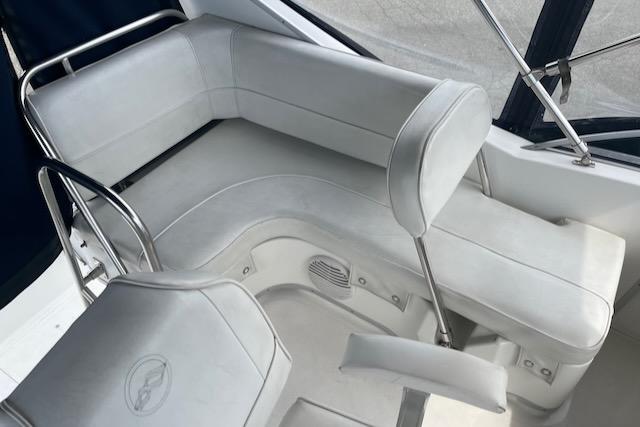 Slide: The Image of Interior seating of a 2000 Bayliner 3388 boat with white upholstery. - 6
