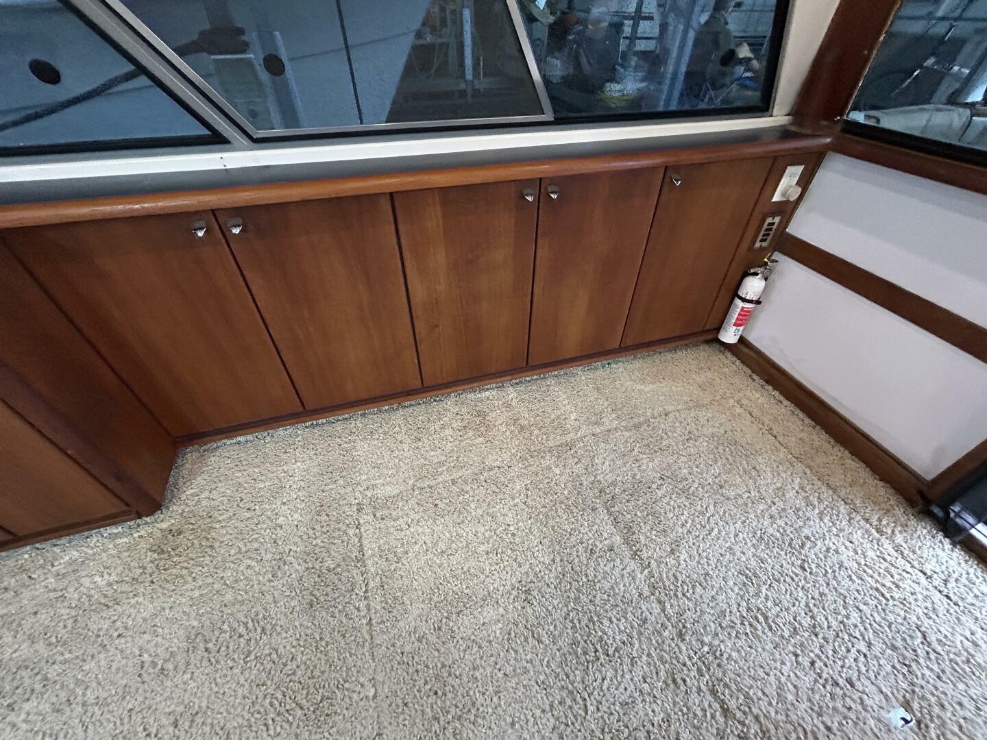 Slide: The Image of 45' Bayliner salon starboard cabinetry - 4903422