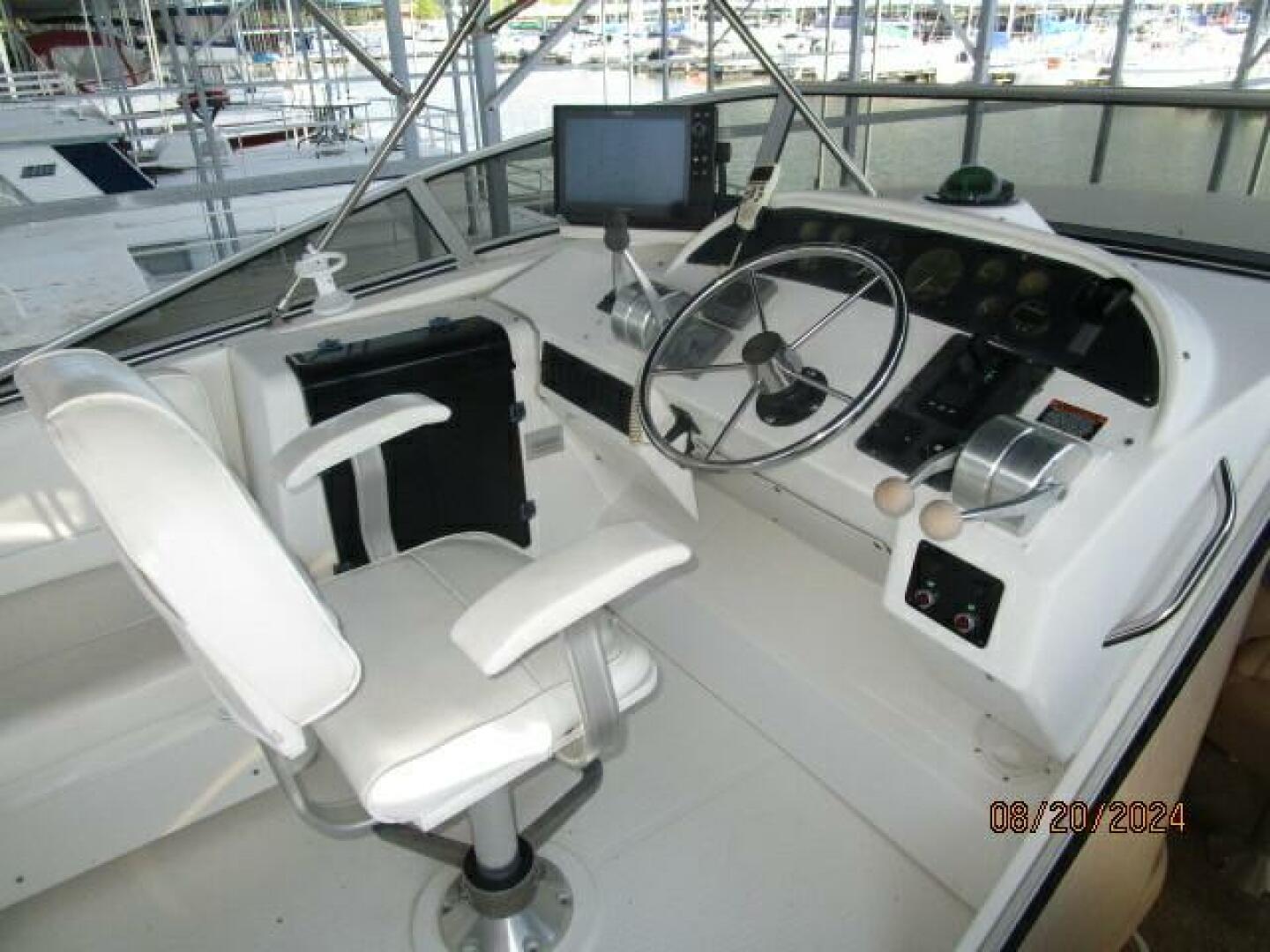 Slide: The Image of 47' Bayliner flybridge helm1 - 4609470