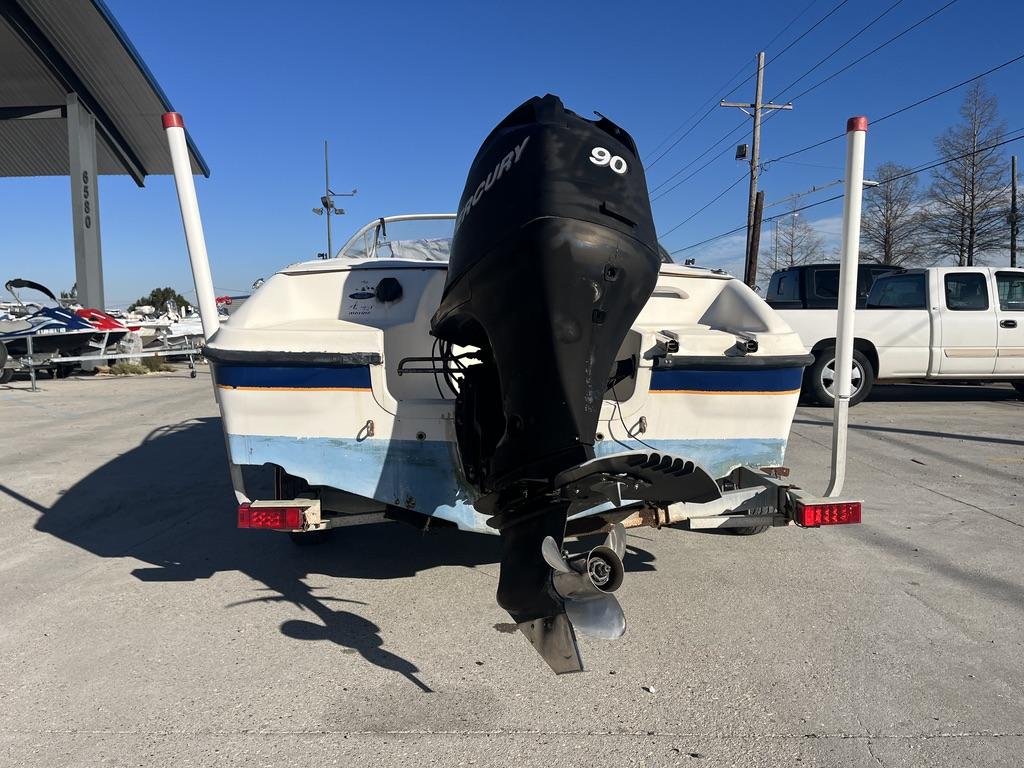 Slide: The Image of 2004 Bayliner 175 boat with Mercury 90 outboard motor on trailer. - 5