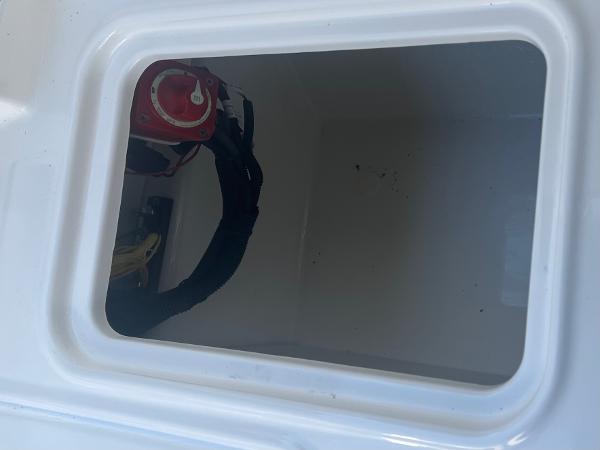 Slide: The Image of Battery compartment of 2024 Bayliner DX2000 boat. - 14