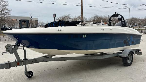 Slide: The Image of 2017 Bayliner Element E 18 boat on a trailer. - 5
