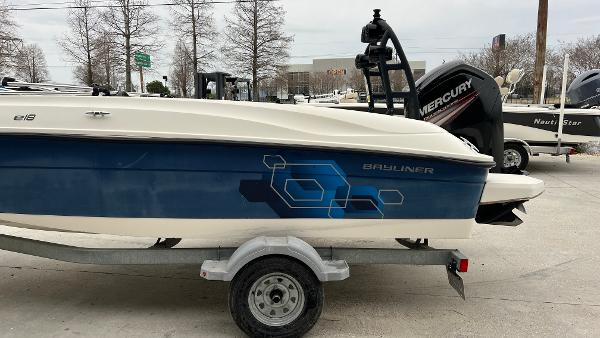 Slide: The Image of 2017 Bayliner Element E 18 boat on trailer with Mercury outboard motor. - 6