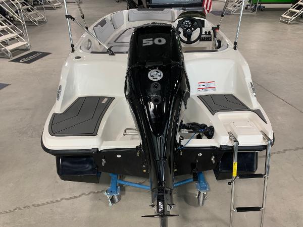 Slide: The Image of 2024 Bayliner Element M15 boat rear view with 50 HP outboard motor. - 2