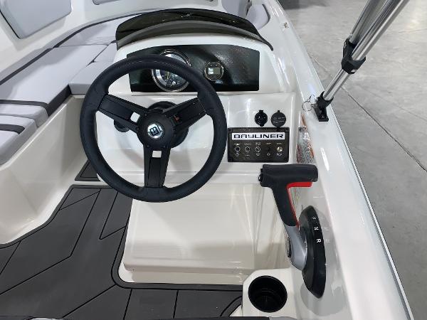 Slide: The Image of 2024 Bayliner Element M15 boat steering console with controls and dashboard. - 5