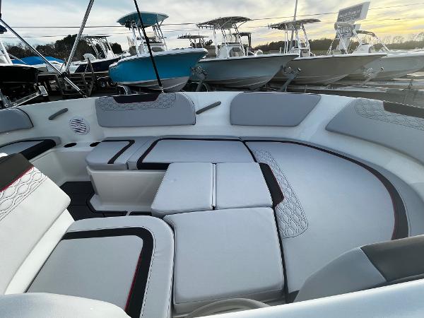 Slide: The Image of 2024 Bayliner Element M15 boat interior with cushioned seating and modern design. - 5