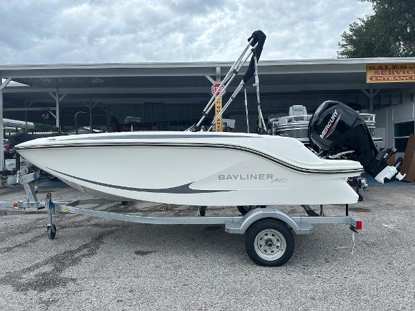 Slide: The Image of 2025 Bayliner Element M15 boat on trailer, side view, outdoors. - 0