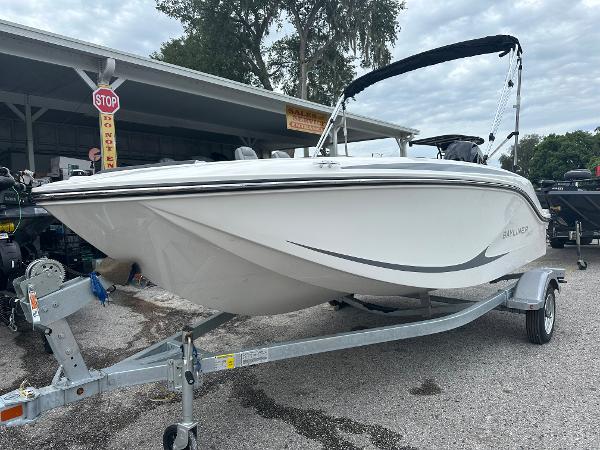 Slide: The Image of 2025 Bayliner Element M15 boat on trailer, parked outdoors. - 1