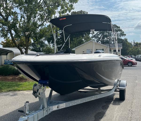 Slide: The Image of 2024 Bayliner Element M17 boat on a trailer with a canopy. - 3