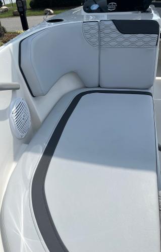 Slide: The Image of 2024 Bayliner Element M17 boat interior seating with modern design. - 8