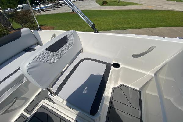 Slide: The Image of Interior seating of 2024 Bayliner Element M19 boat with gray and white upholstery. - 11