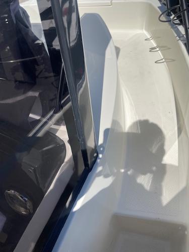 Slide: The Image of 2024 Bayliner Trophy 23 Pilothouse deck area with shadow. - 7
