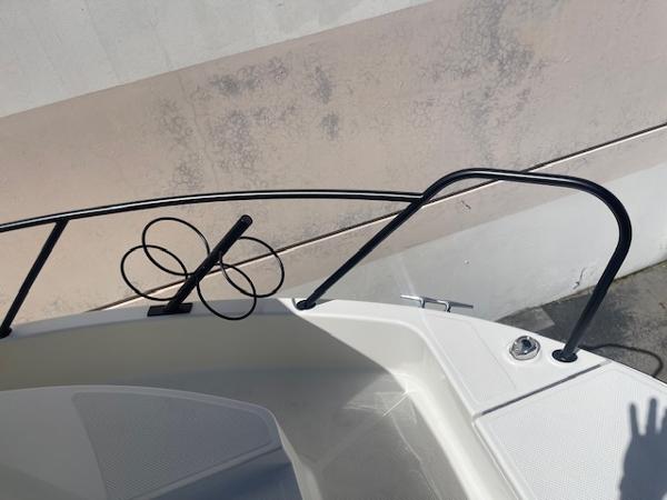 Slide: The Image of 2024 Bayliner Trophy 23 Pilothouse bow with railing and anchor holder. - 8