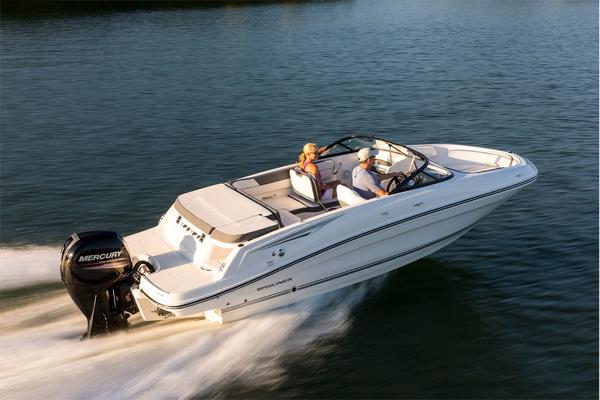 Slide: The Image of 2023 Bayliner VR5 Bowrider cruising on water with two passengers. - 3