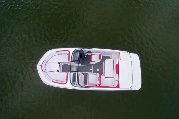 Slide: The Image of 2023 Bayliner VR5 Bowrider boat on water, aerial view. - 9