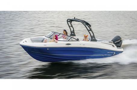 Slide: The Image of 2023 Bayliner VR6 Bowrider Outboard cruising on water with passengers. - 1