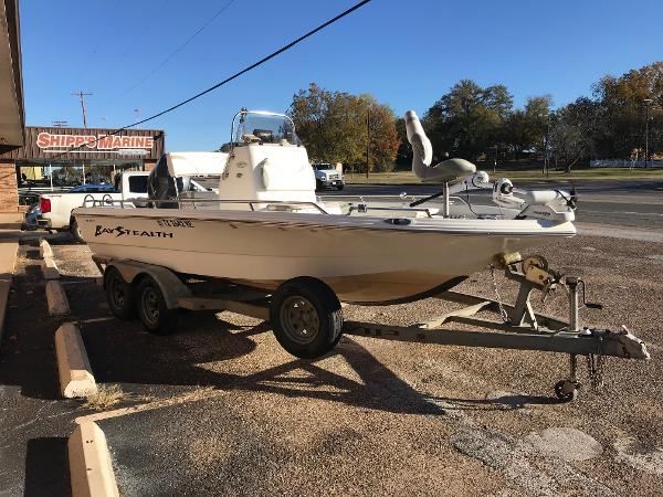 Slide: The Image of 2005 Bay Stealth 2030 Liner boat on trailer at Shipps Marine. - 1
