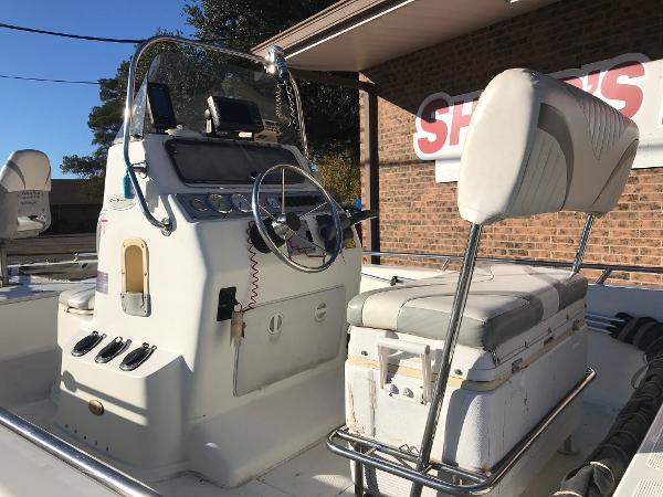 Slide: The Image of 2005 Bay Stealth 2030 Liner boat interior with steering console and seating. - 4