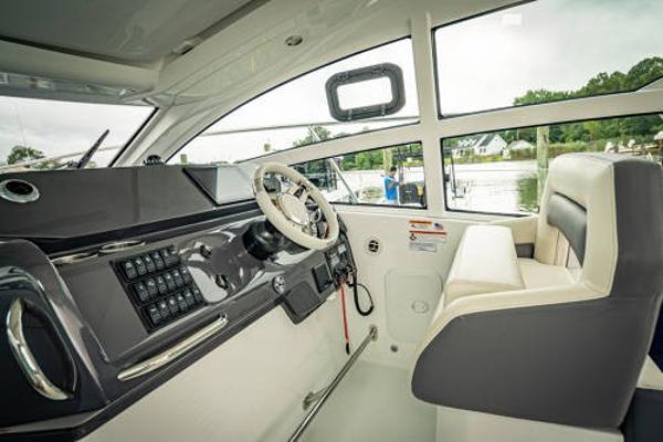Slide: The Image of Interior helm of 2024 Beneteau 36 Gran Turismo GT yacht with modern controls. - 15
