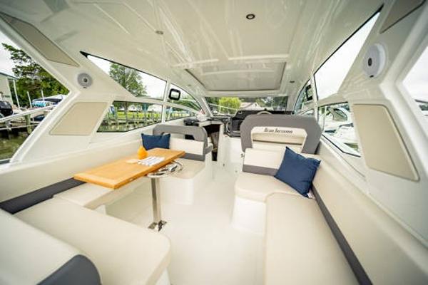Slide: The Image of Interior of 2024 Beneteau 36 Gran Turismo GT yacht with luxurious seating. - 18