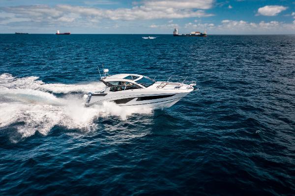 Slide: The Image of 2024 Beneteau 36 Gran Turismo GT cruising on open water. - 2