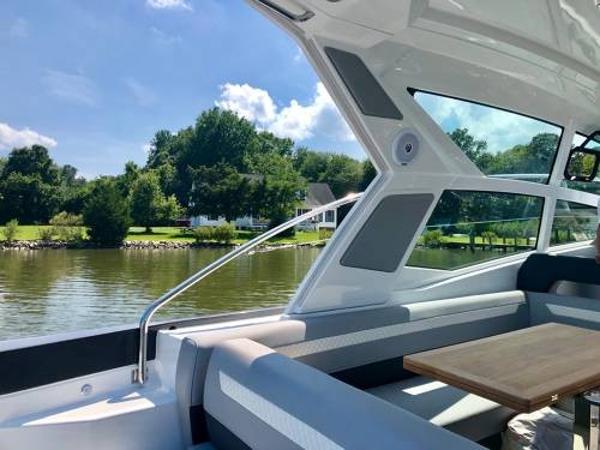 Slide: The Image of Interior view of 2024 Beneteau 36 Gran Turismo GT yacht with scenic water backdrop. - 20