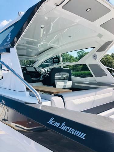 Slide: The Image of 2024 Beneteau 36 Gran Turismo GT luxury yacht interior with modern seating and sleek design. - 23