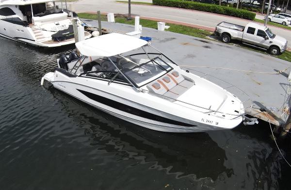 Slide: The Image of 2020 Beneteau Flyer 32 boat docked in marina, aerial view. - 0