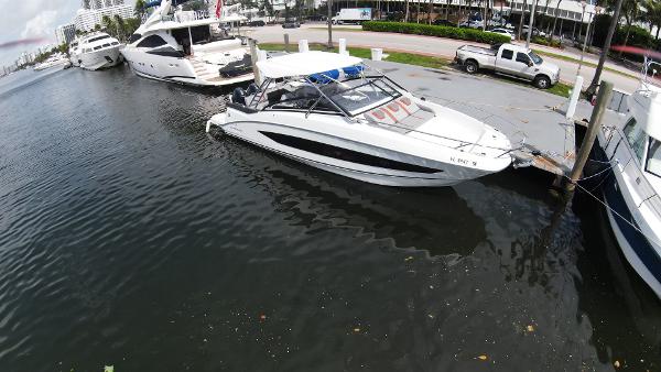 Slide: The Image of 2020 Beneteau Flyer 32 docked at marina, side view. - 3