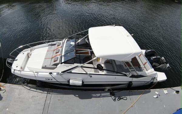 Slide: The Image of 2020 Beneteau Flyer 32 boat docked on calm water, aerial view. - 4