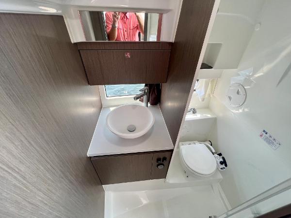 Slide: The Image of Modern bathroom in 2024 Beneteau Flyer 9 SUNdeck boat with sink and toilet. - 13