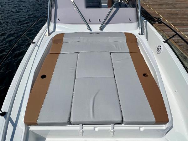 Slide: The Image of 2024 Beneteau Flyer 9 SUNdeck with cushioned sunbathing area on deck. - 16