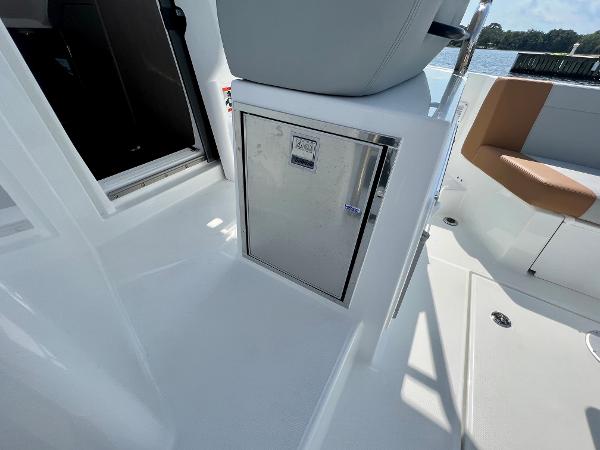 Slide: The Image of Beneteau Flyer 9 SUNdeck 2024 interior, featuring a stainless steel storage compartment. - 22