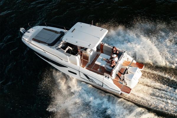 Slide: The Image of 2024 Beneteau Flyer 9 SUNdeck cruising on water, aerial view, luxury motorboat. - 3