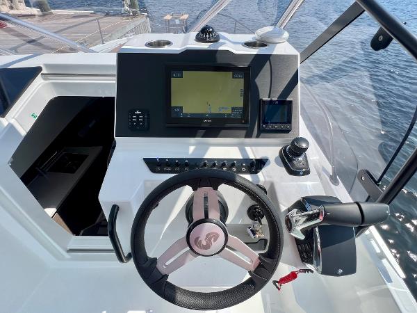 Slide: The Image of 2024 Beneteau Flyer 9 SUNdeck helm with modern navigation system and controls. - 8