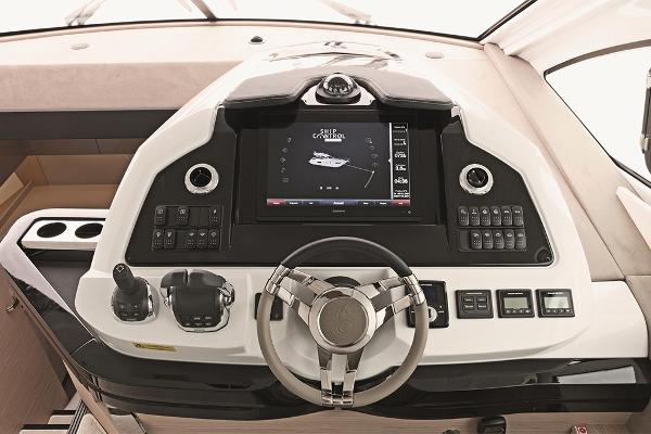 Slide: The Image of 2021 Beneteau Gran Turismo 50 Sportfly helm with advanced navigation system. - 13