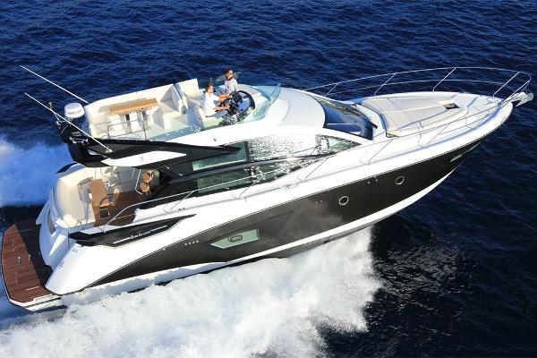 Slide: The Image of 2021 Beneteau Gran Turismo 50 Sportfly cruising on open water. - 5