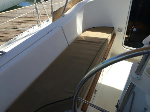 Slide: The Image of Beneteau Oceanis 321 sailboat cockpit with cushioned seating, 2000 model. - 36