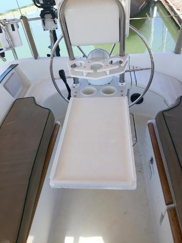 Slide: The Image of 2000 Beneteau Oceanis 321 cockpit with steering wheel and seating area. - 39