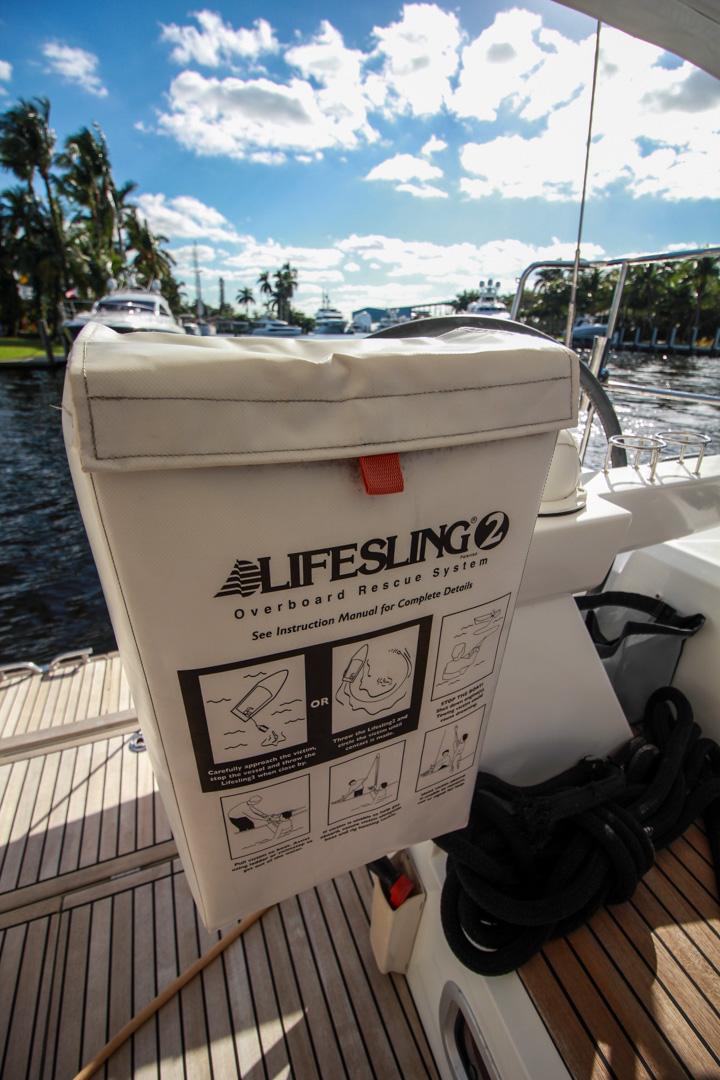 Slide: The Image of Lifesling 2 overboard rescue system on a 2015 Beneteau Sense 55 yacht deck. - 19